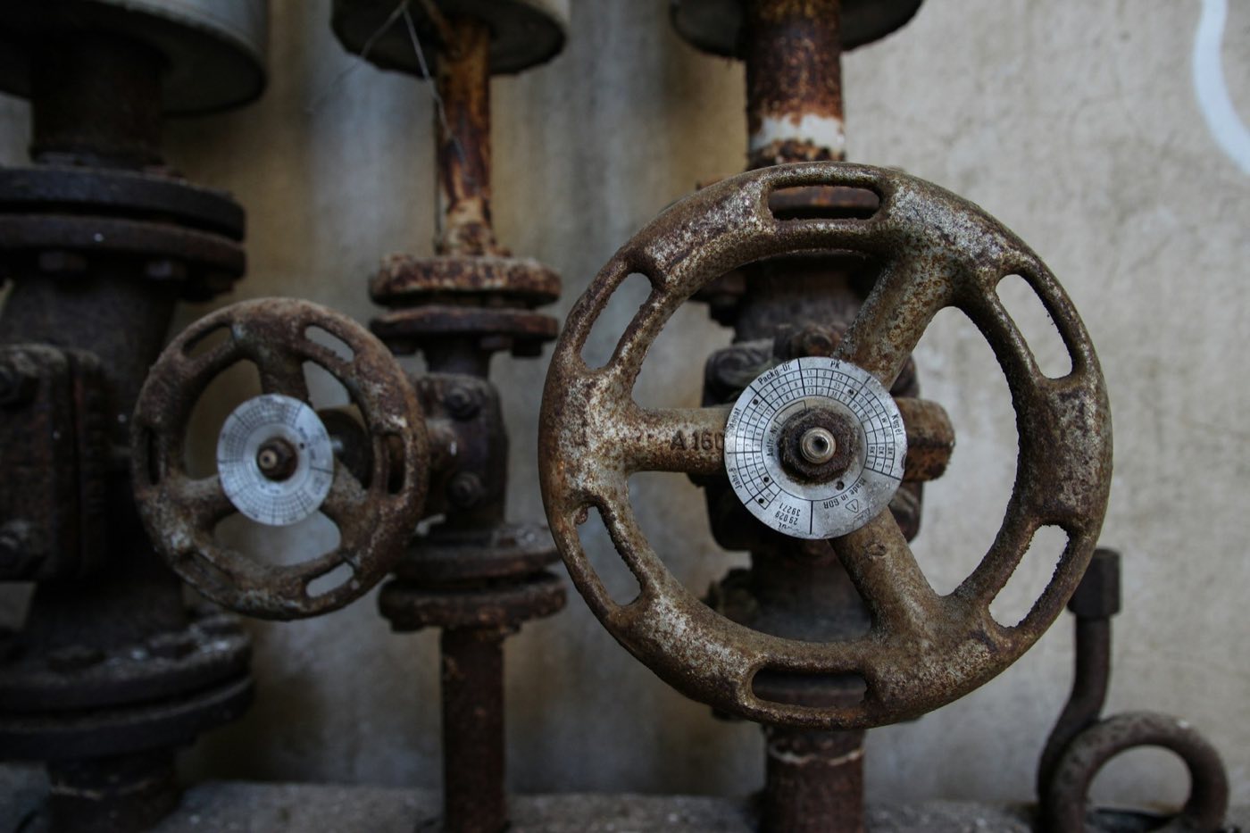 Row of weathered valve wheels